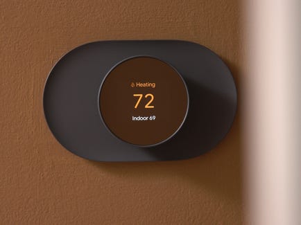 A Nest thermostat set to 72 degrees Fahrenheit
