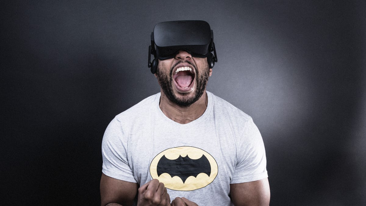 A man with an Oculus headset on his face