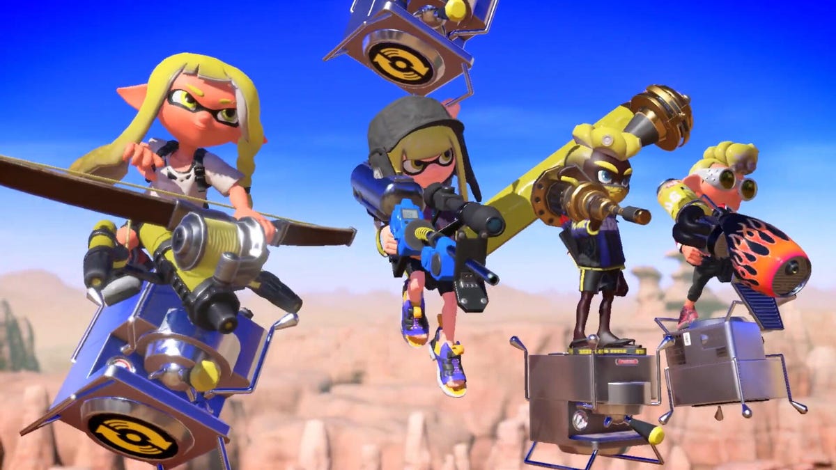 a team of four Splatoon characters ready their weapons