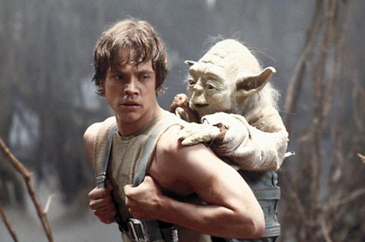 Luke Skywalker gives Yoda a lift.