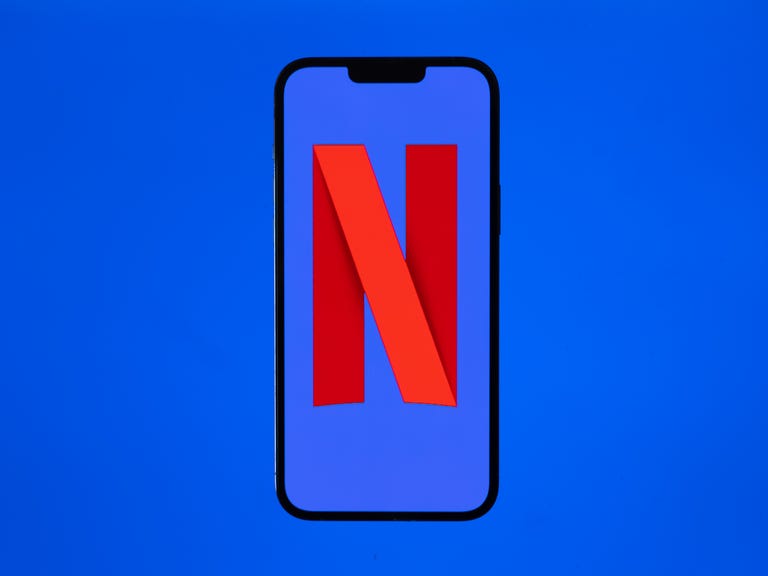 Netflix logo on an iPhone with blue background