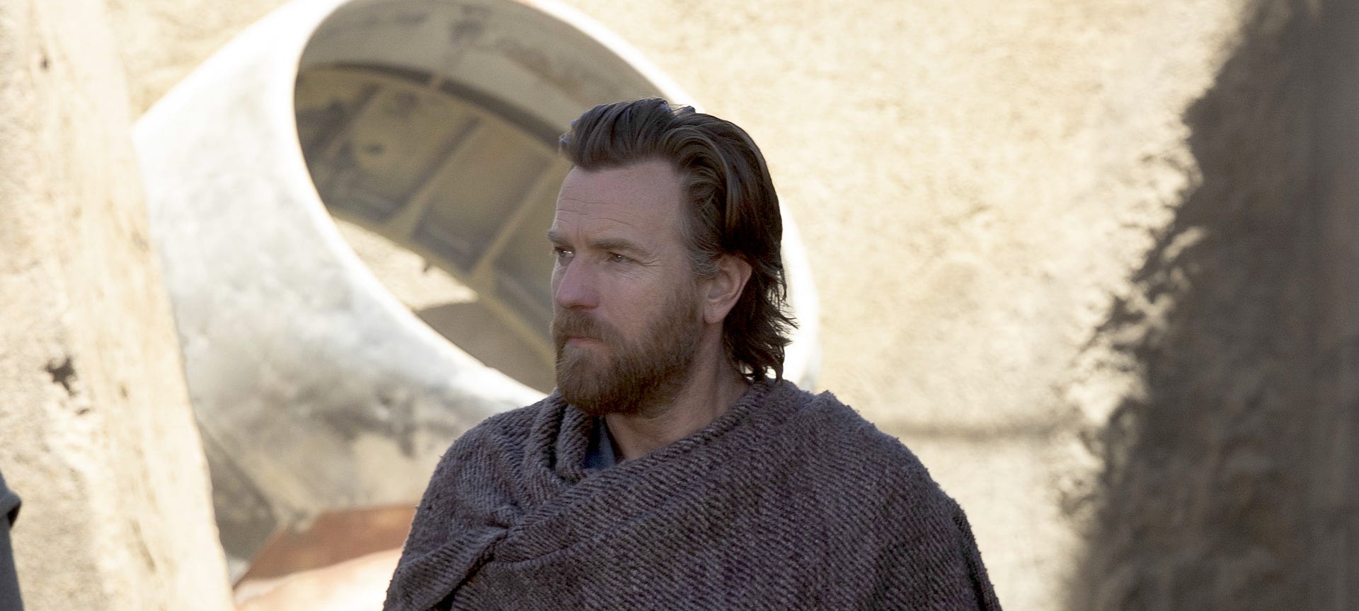 Ewan McGregor looks handsome in a beard and scruffy robes in Obi-Wan Kenobi on Disney Plus.
