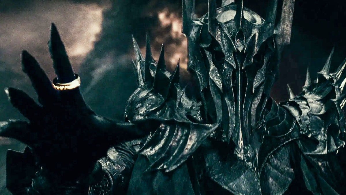Sauron in armor with the One Ring on his dark fingers