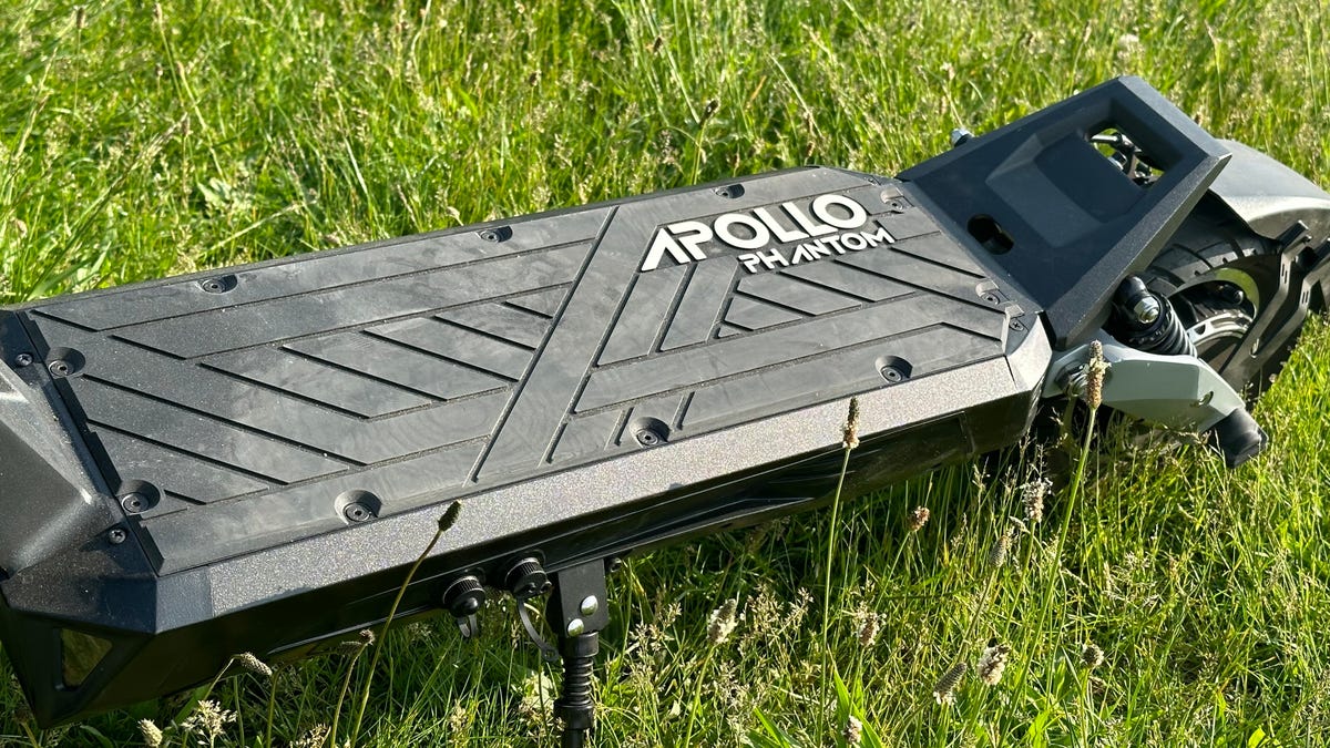 The rubberized deck of the Phantom v3 in some unmown grass.