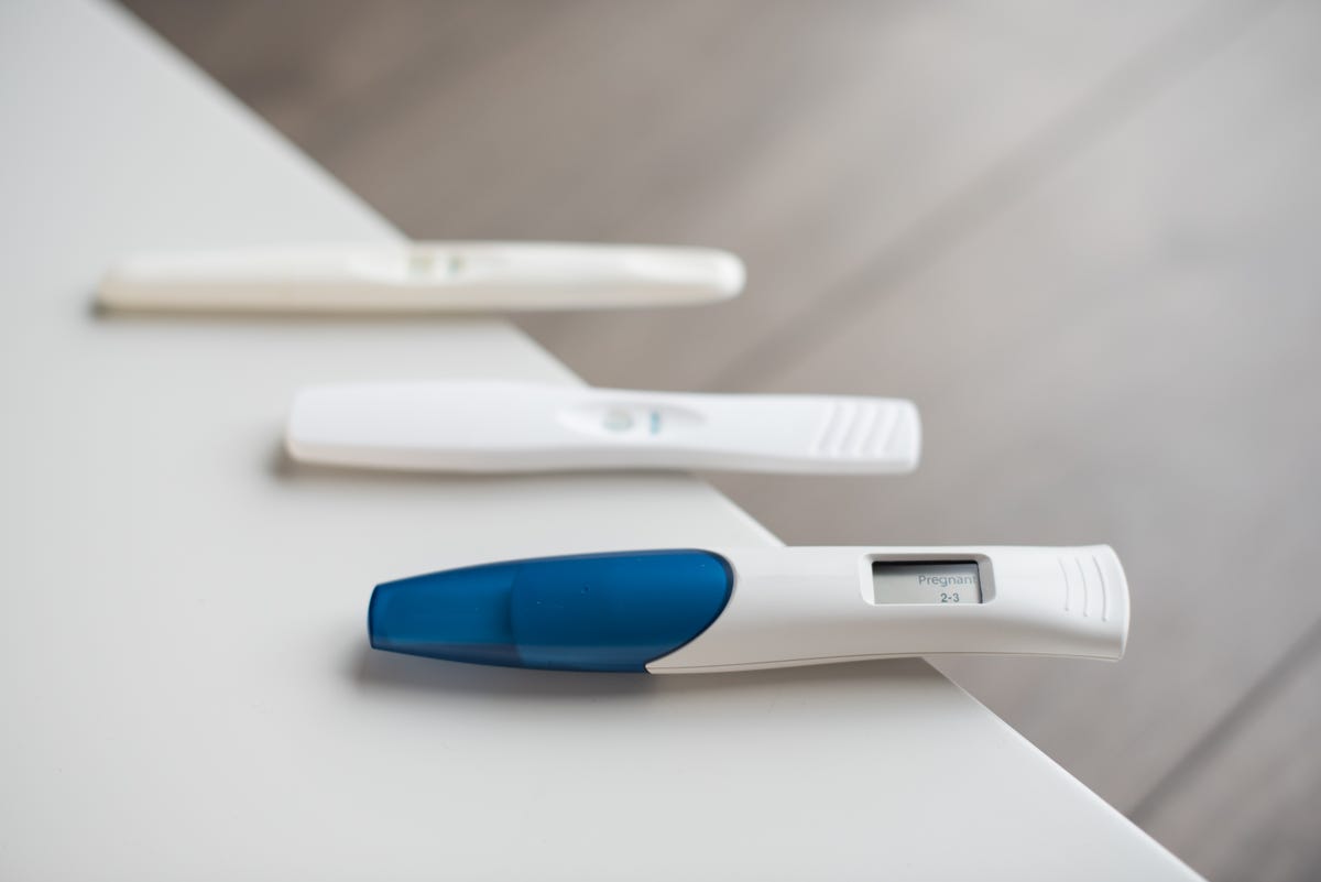 Three positive pregnancy tests.