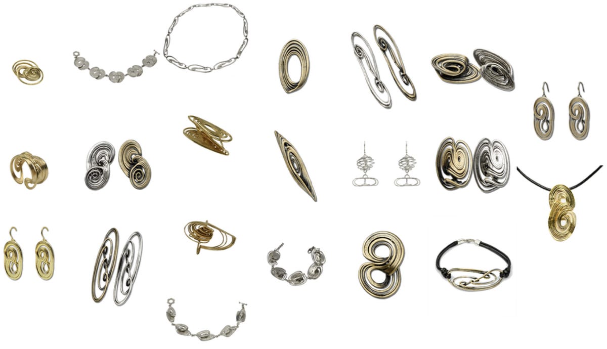 Various pieces of jewelry based on the team's chaotic attractors.