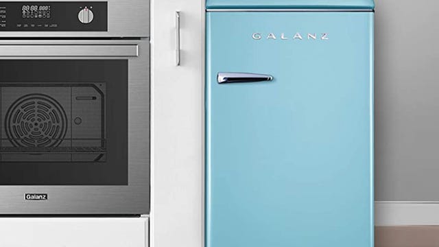 galanz mini fridge next to oven