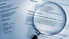 Resume with a magnifying glass on top of it