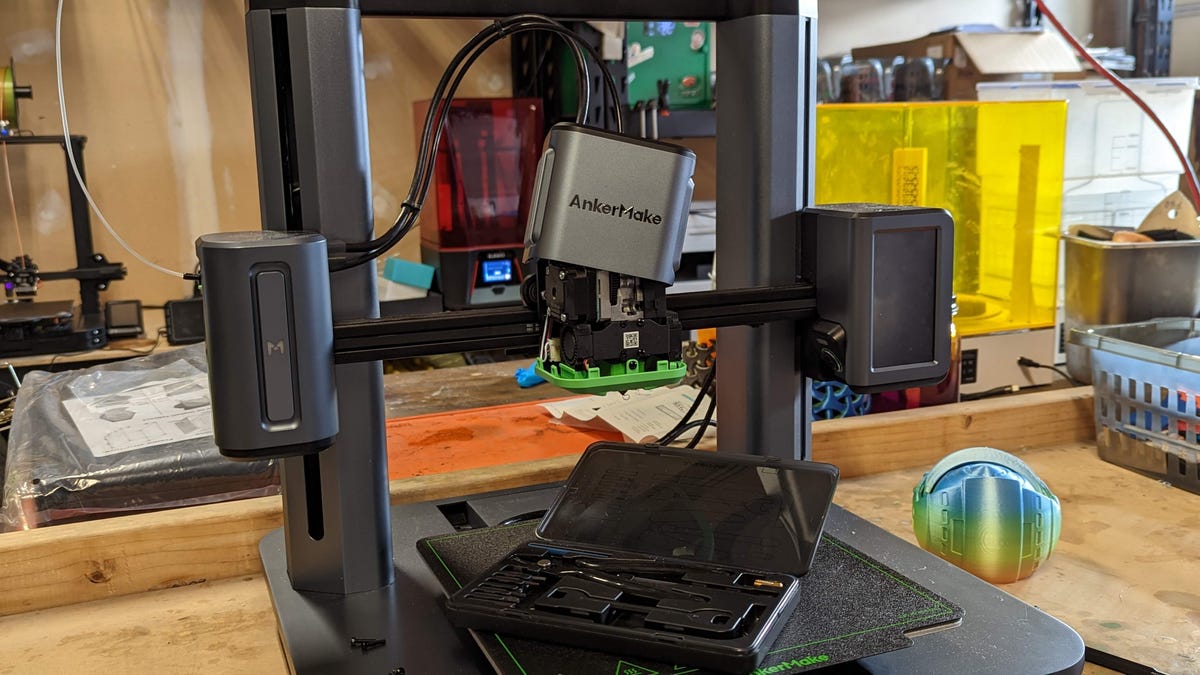 The AnkerMake 3D printer with its hot end removed for repair