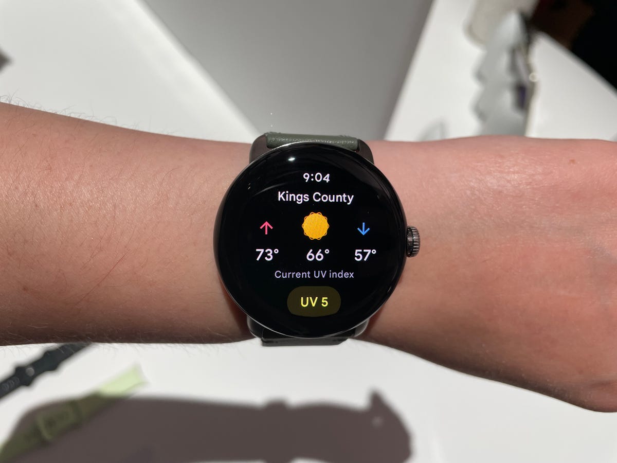 Google's Pixel Watch showing the weather being worn