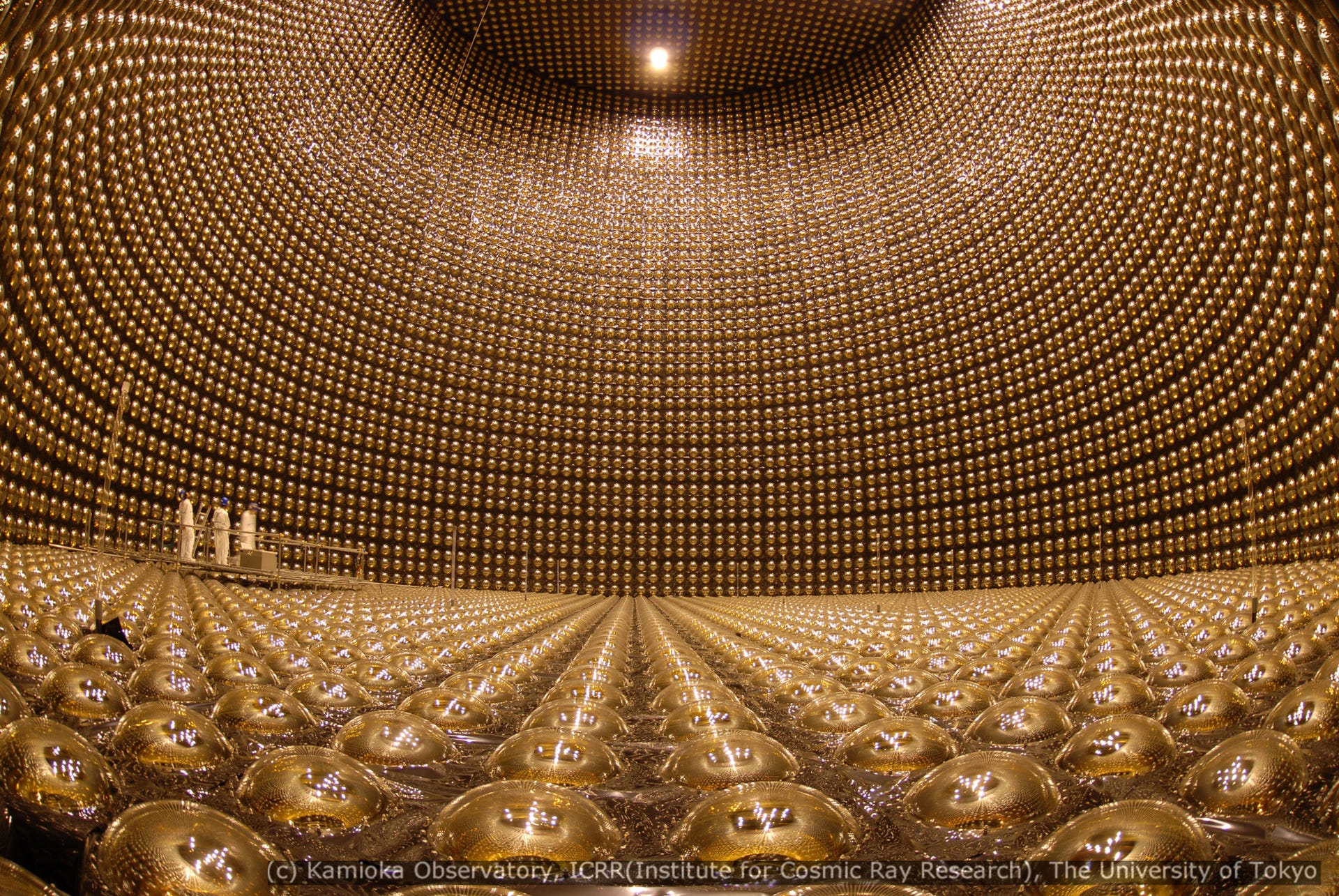 The massive Super-Kamiokande neutrino detector in Japan is studded with thousands of light sensors. It along with a related facility in Canada were responsible for detecting neutrino behavior that meant the particles had mass.