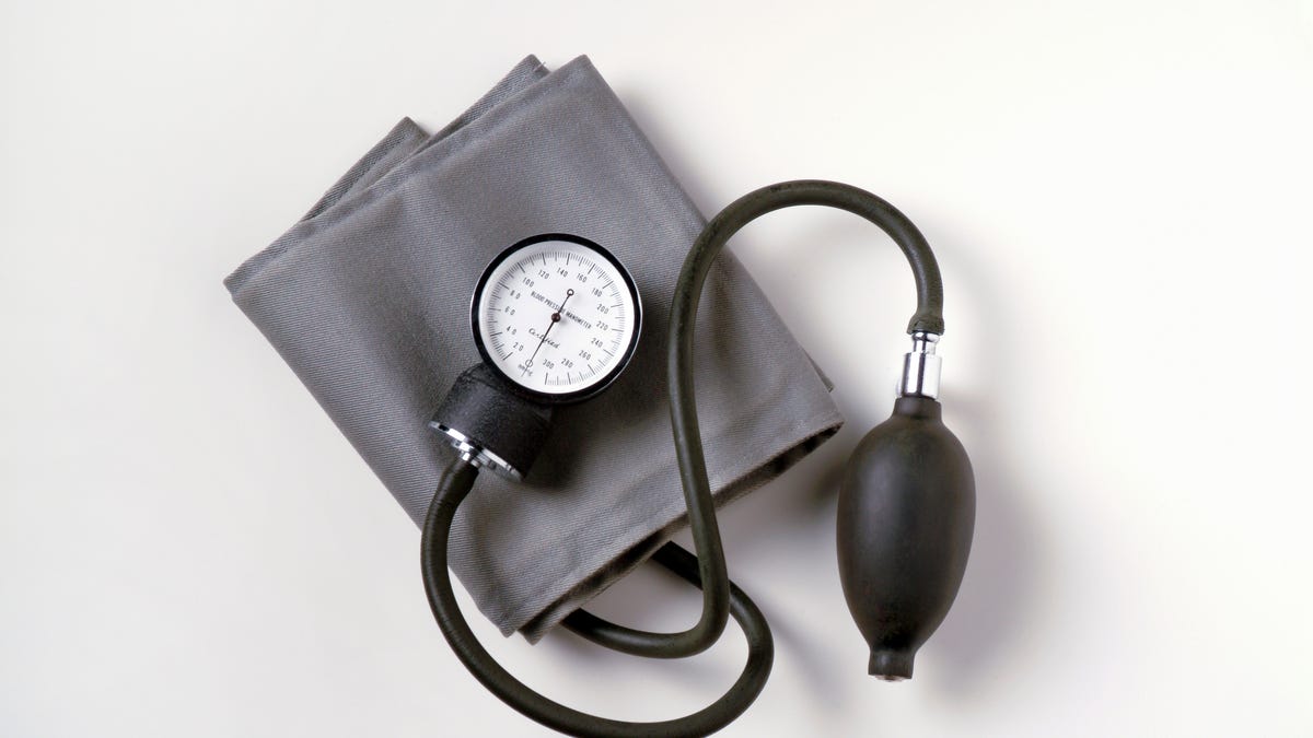 A black and gray blood pressure cuff.