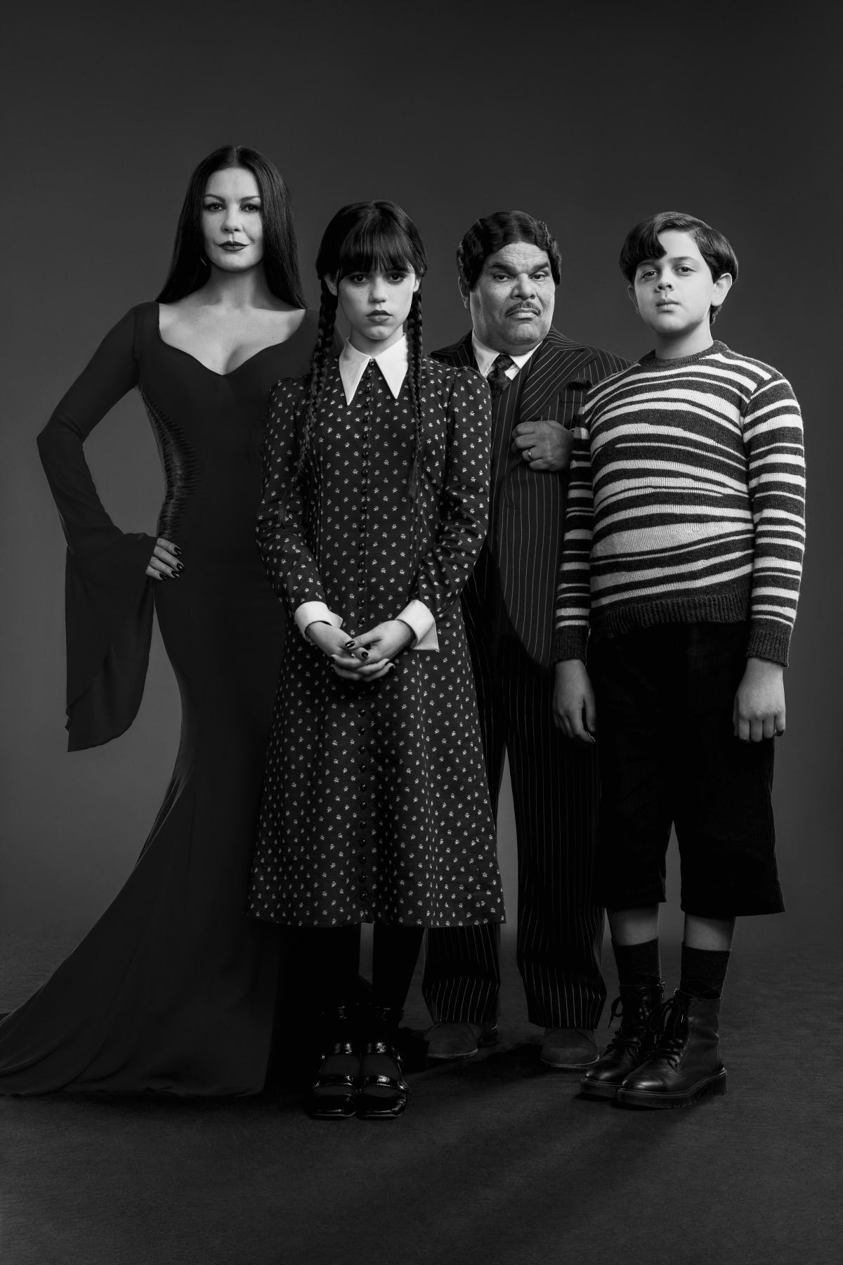 A family portrait of the comically gothic Addams Family.