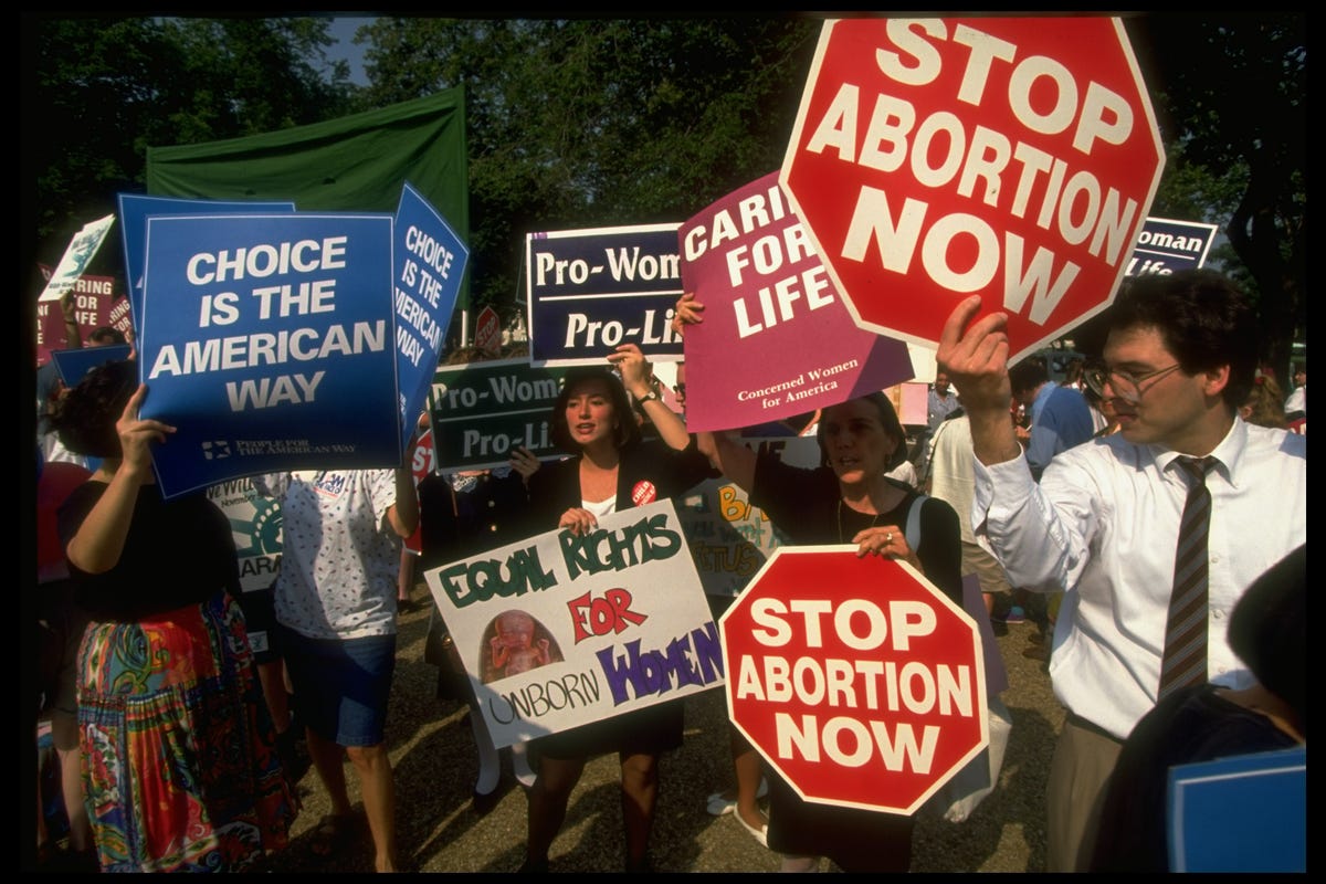 Anti-abortion and abortion-rights activists square off at a 1992 protest