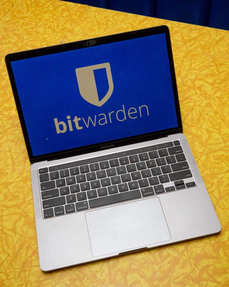 Bitwarden logo displayed on a laptop