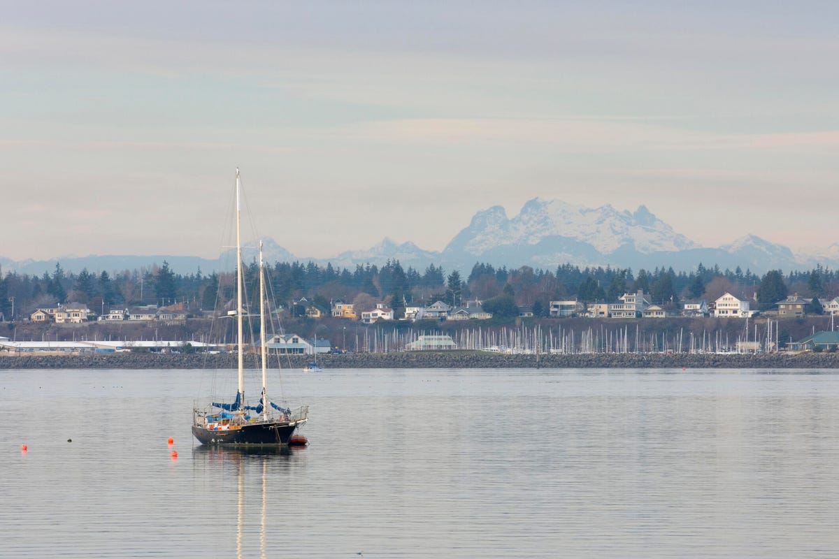 Sailboat anchored in Bellingham Bay, Boulevard Park in Bellingham, Washington.