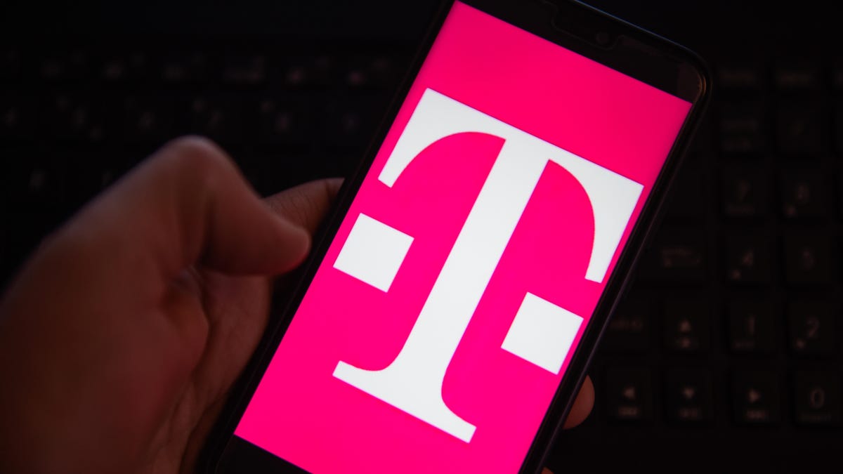 T mobile logo is seen on an android mobile phone