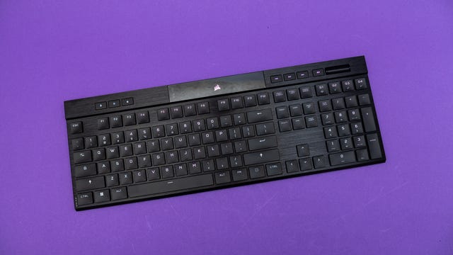 Corsair K100 Air keyboard seen from above on a purple background