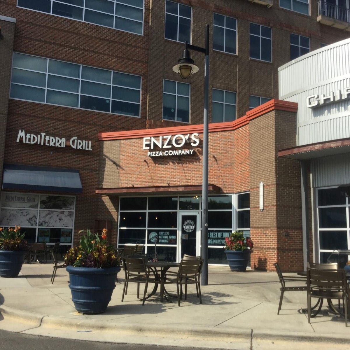 Between Enzo's Pizza Company, MediTerra Grill and Chipotle's