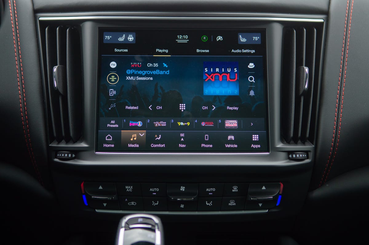 2022 Maserati Levante Trofeo in red, showing off the Uconnect-based infotainment