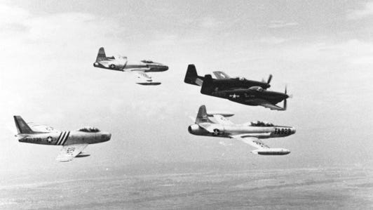 Flying together: a North American F-82 Twin Mustang, a Lockheed F-94 Starfire, a Lockheed F-80 Shooting Star and a North American F-86 Sabre.