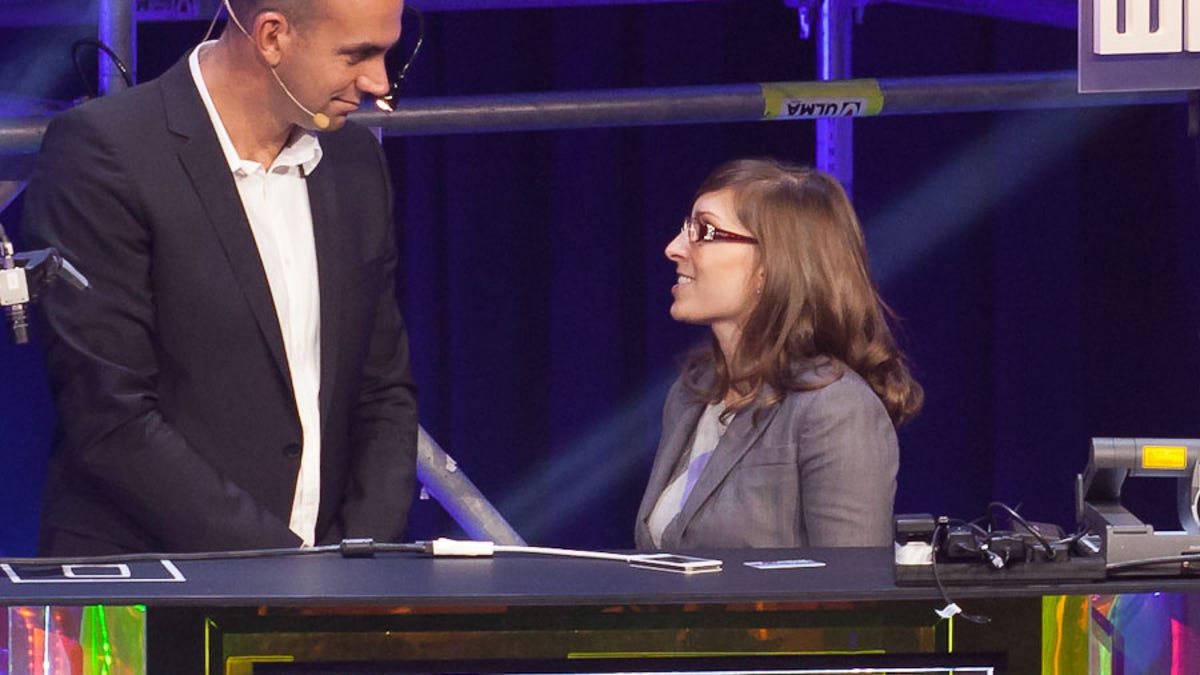 TaskRabbit founder and product officer Leah Busque, right, talks with LeWeb conference leader Loic Le Meur at the 2011 conference in Paris.