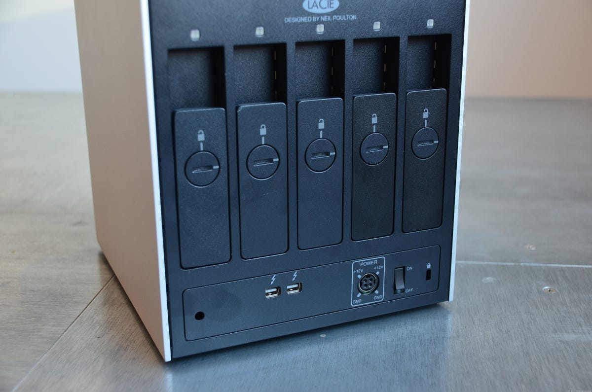 The 5big Thunderbolt drive bays are easily accessible from its back. Note the two drive bays that are darker than the other three, suggesting a dual RAID 0 and RAID 1 setup.