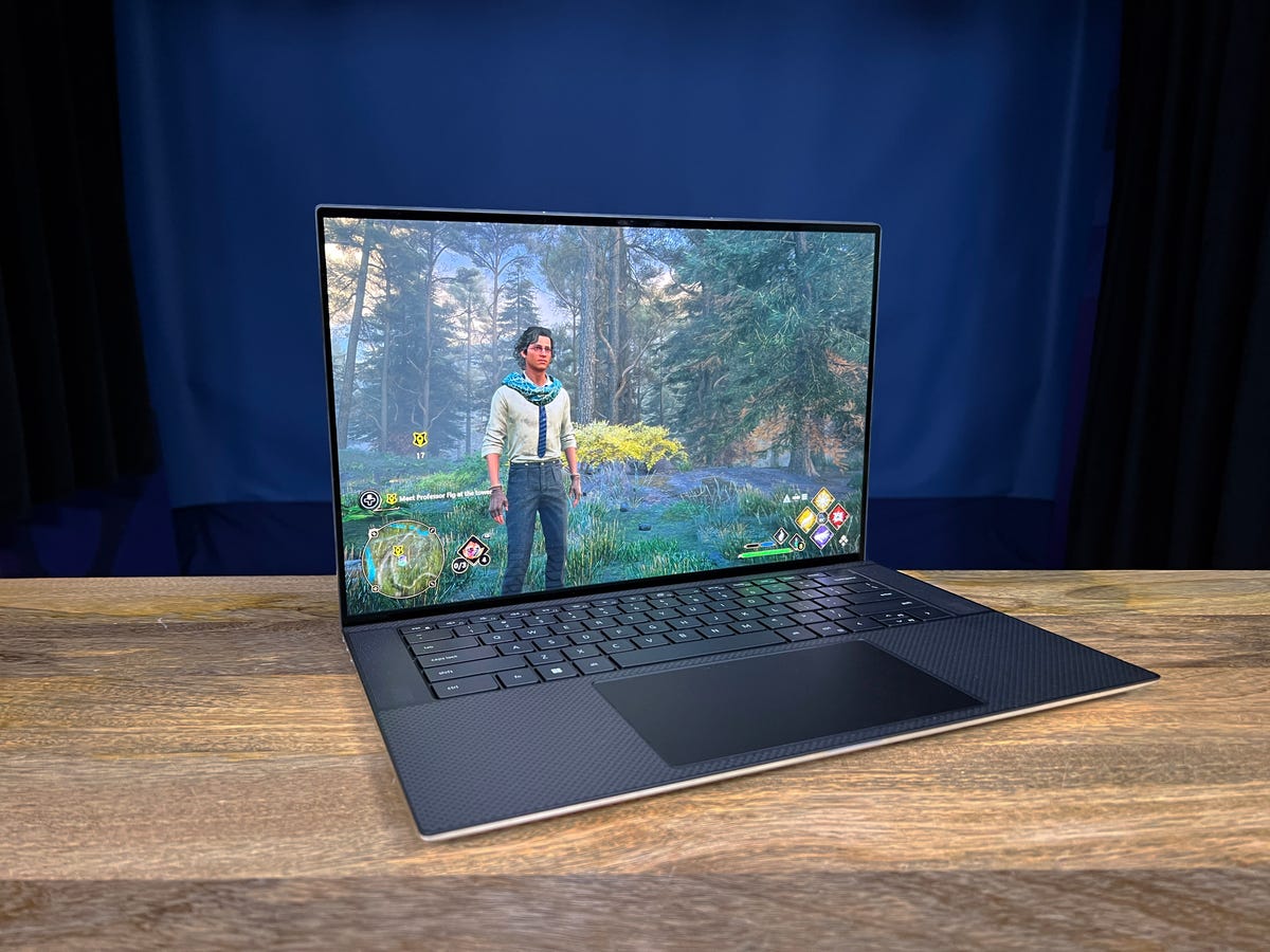 Dell XPS 15 open with a game scene on the screen