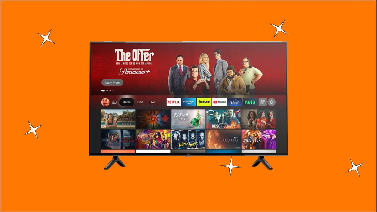 An Amazon Fire TV against an orange background.