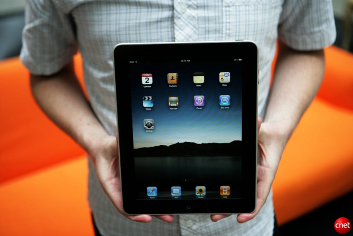 Photo of iPad being held.