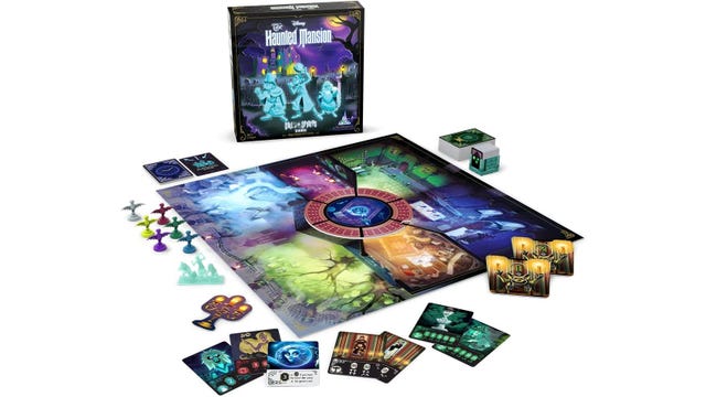 The haunted mansion board game laid out ready to play