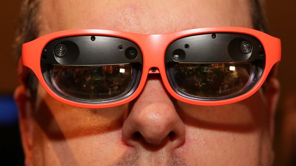 mixed reality glasses on the face of CNET writer