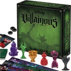 Small trophies representing Disney villains in front of a green box