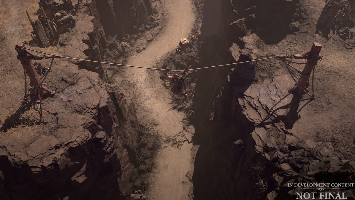 a hero crosses a chasm via rope