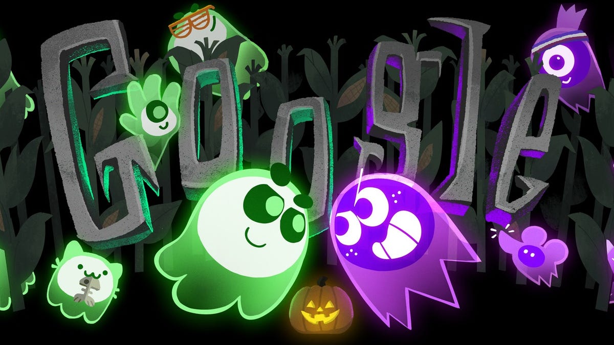 The Google logo done up in a Halloween-y font, surrounded by purple and green cartoon ghouls