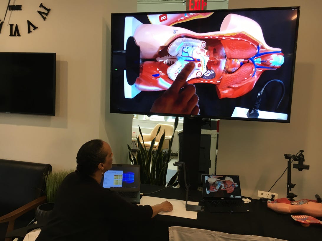 A product manager at Proximie shows how 5G helps bring AR capabilities to telemedicine.