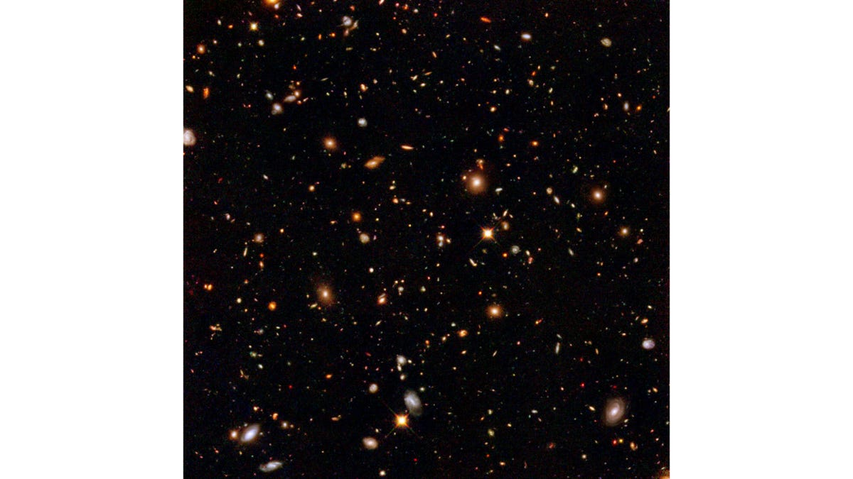 A bunch of our universe's faintest galaxies, seen with Hubble's infrared detectors.