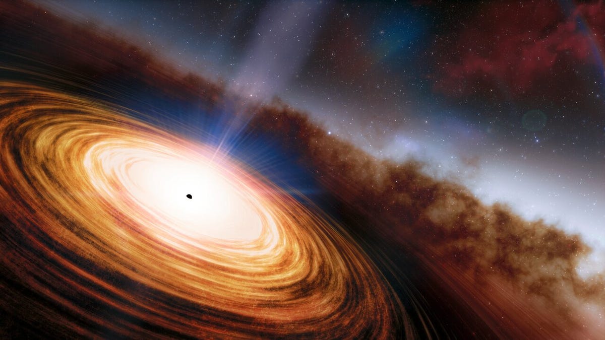 A jet of light is seen stemming from a black hole, around which an orange accretion disk appears to be present.