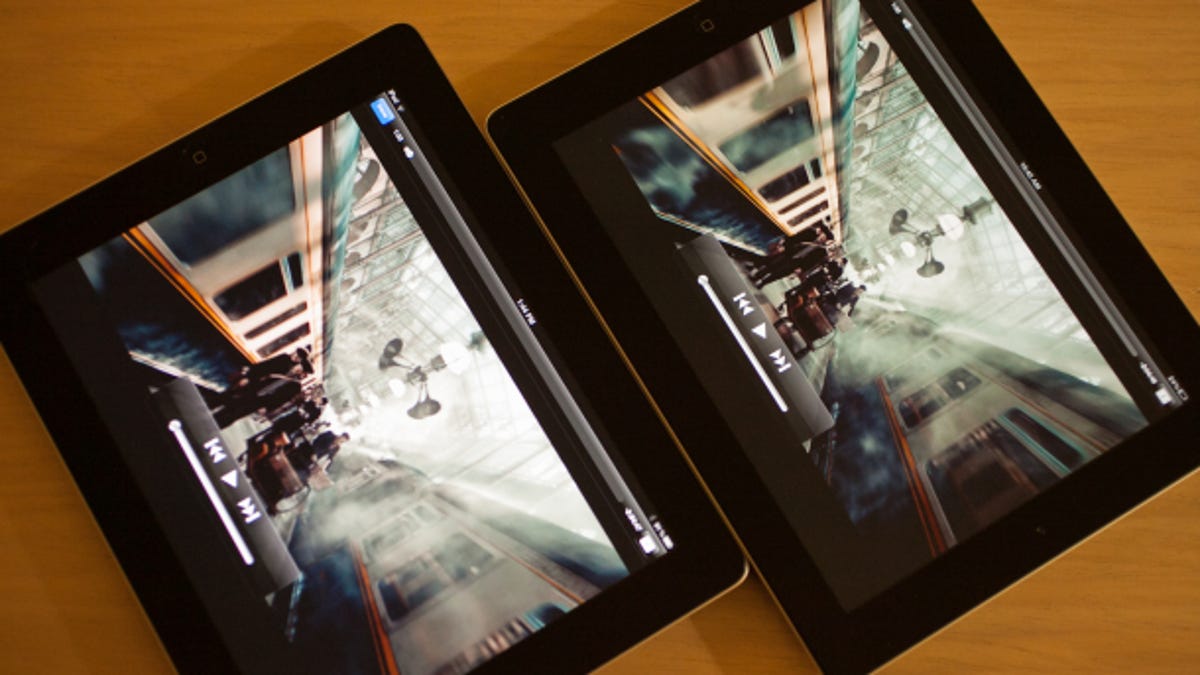 An iPad 2 next to Apple's third-generation model.