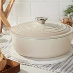 le creuset dutch oven round on table