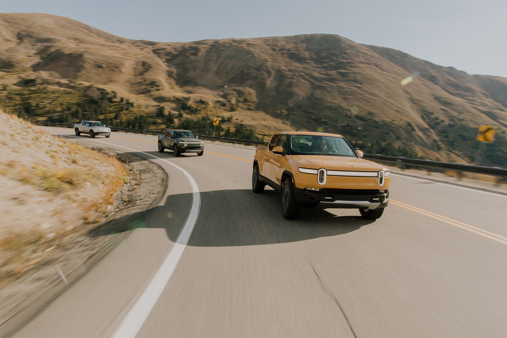 2022 Rivian R1T on a road in the hills