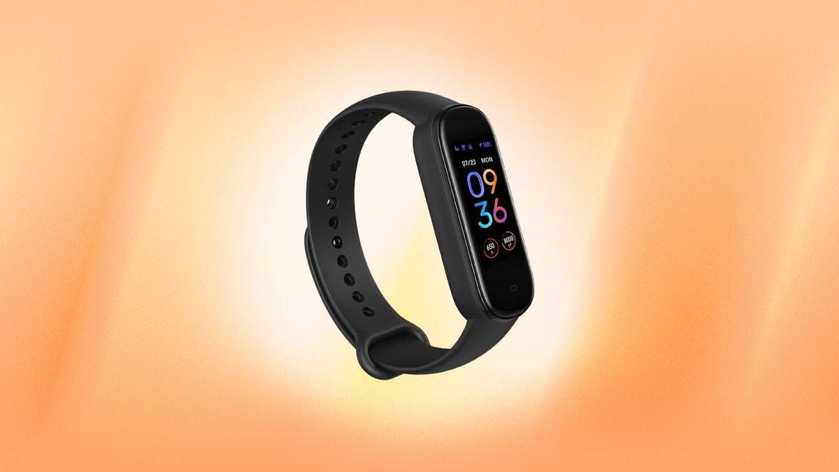 An Amazfit fitness tracker against an orange background.