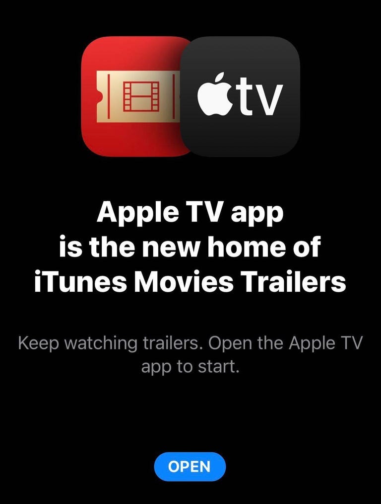A black screen with the iTunes Movie Trailers logo showing a ticket stub next to the Apple TV logo