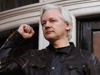 <p>WikiLeaks founder Julian Assange addresses the media from the balcony of the Embassy of Ecuador in London in 2017.</p>