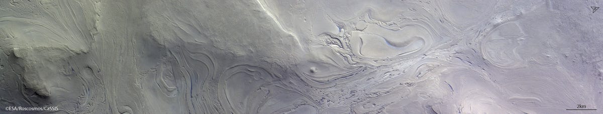 swirling-deposits-in-a-giant-impact-basin-pillars