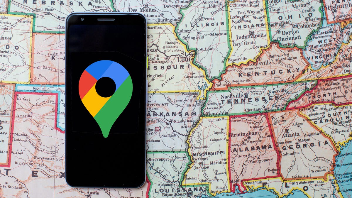 Phone with Google Maps logo on map of the United States.