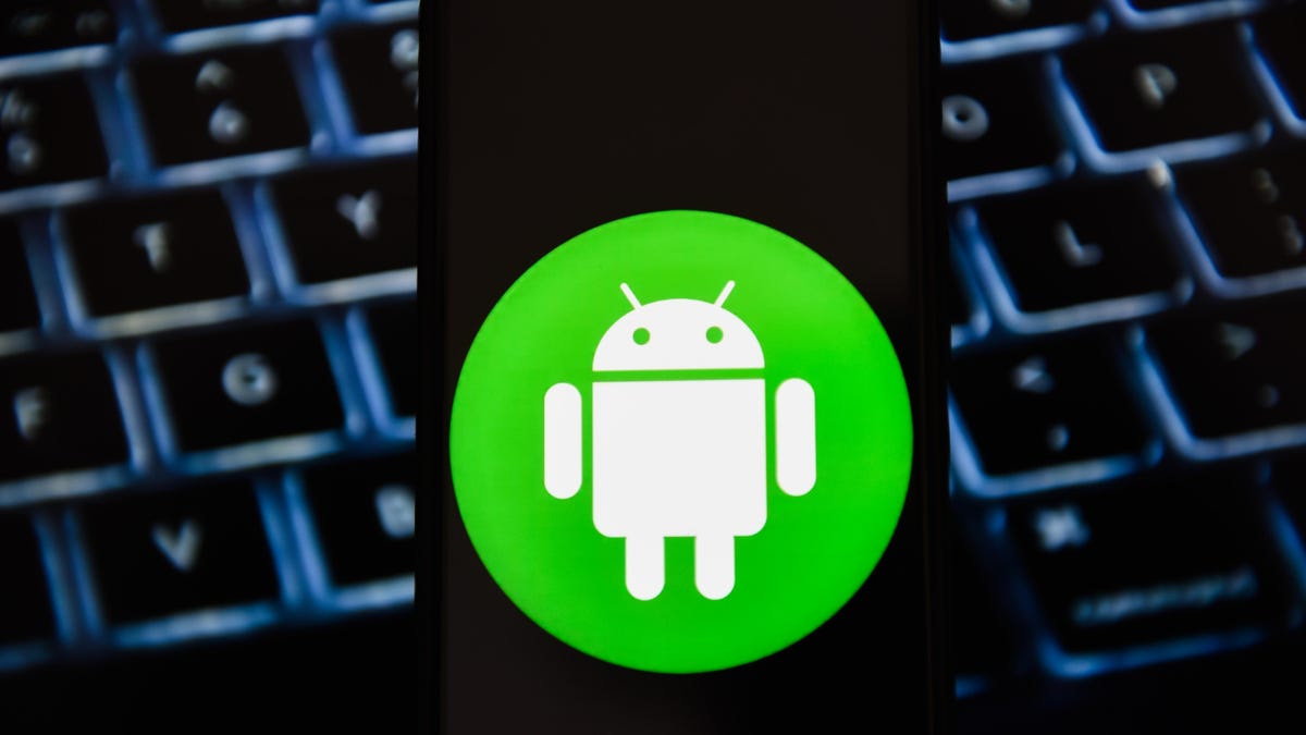 In this photo illustration a Android logo seen displayed on