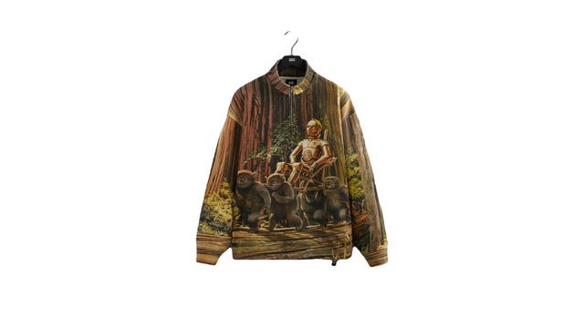 A sweater with an image of C3-PO on the front