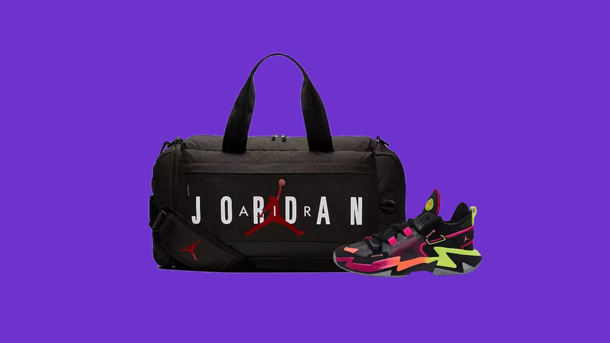 A black, white and red Jordan duffle bag next to a multicolored Jordan shoe on a purple background