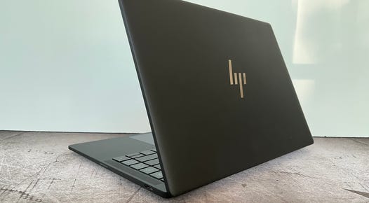 HP Dragonfly Pro in front of a gray wall